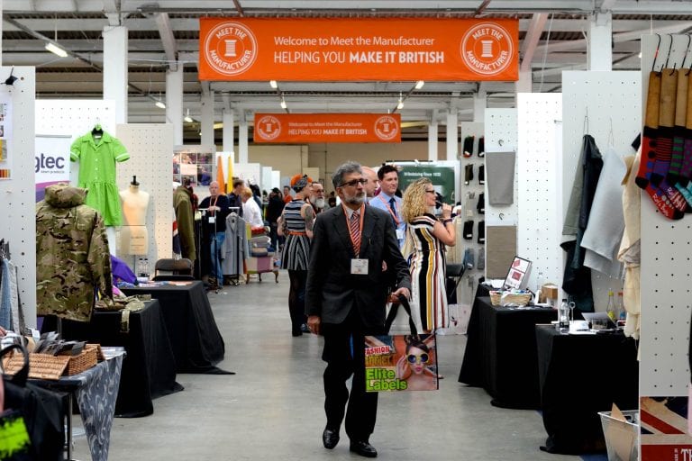 Visitors walking through a previous Make it British trade show