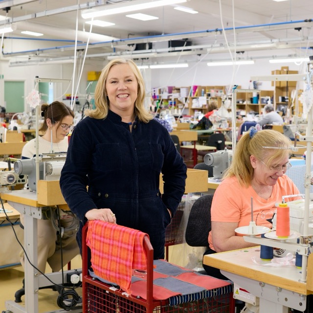 Kate Hills on the factory floor at David Nieper